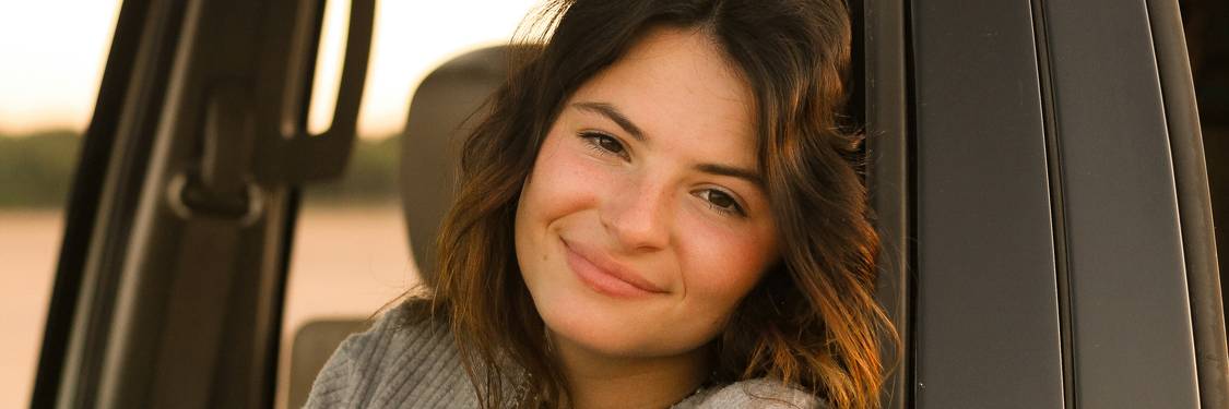 A defensive driving classroom or the official course completion certificate as found in Texas. Stock photo should depict adult learners or a Texas-themed certificate.